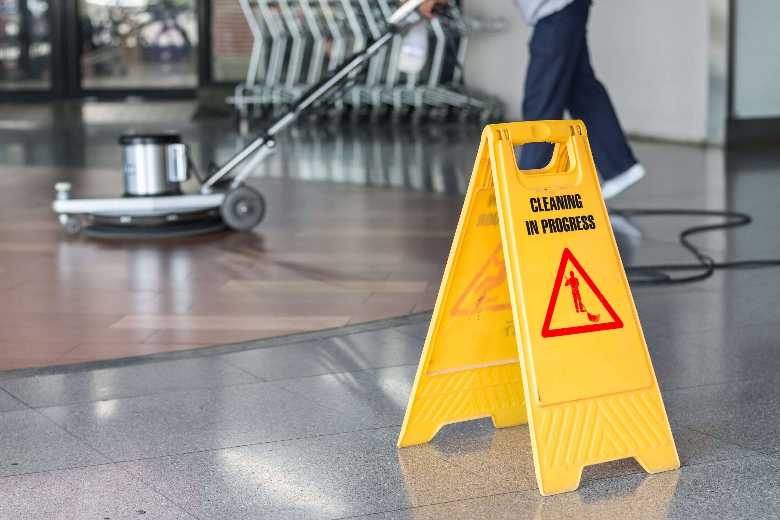 cleaner cleaning a floor at shopping centre