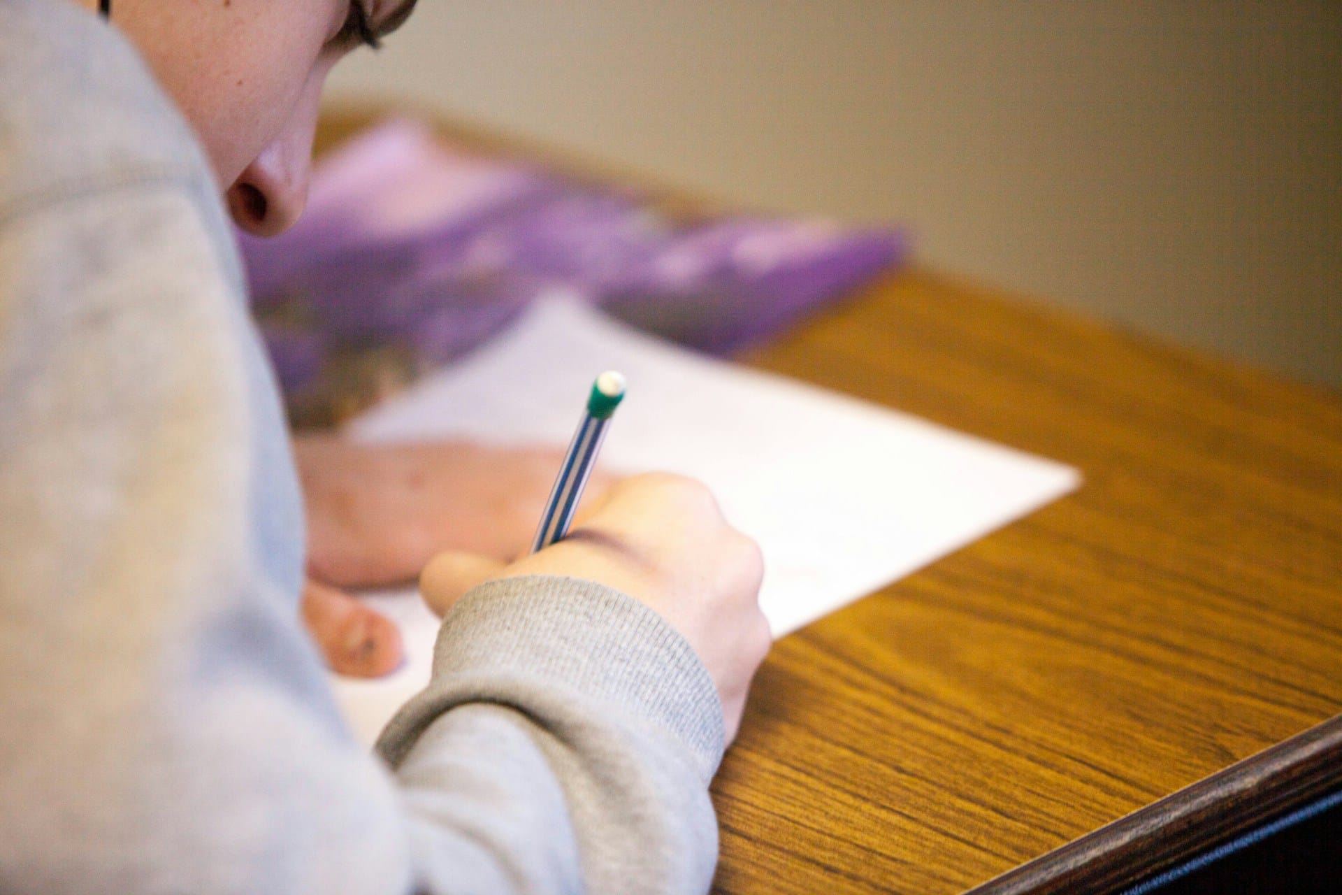 person learning at school on desk